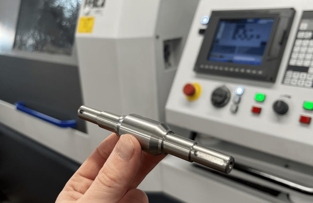 precision sliding head machined metal shaft UK